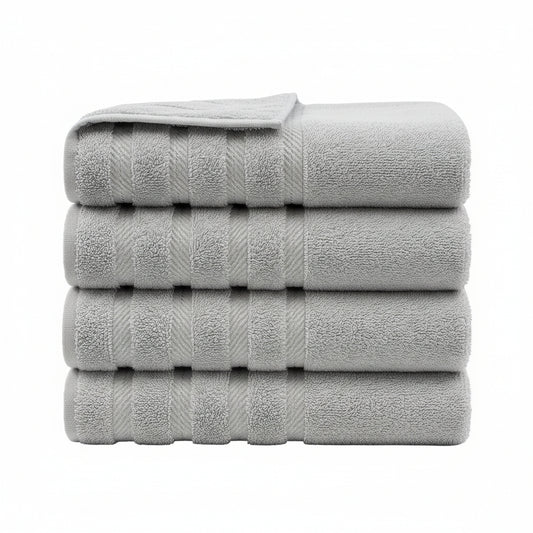 Stack of light gray towels on a white background